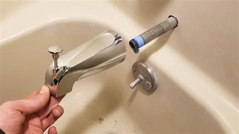 Tub Spout Leaking From Back [ Fix Yourself ]